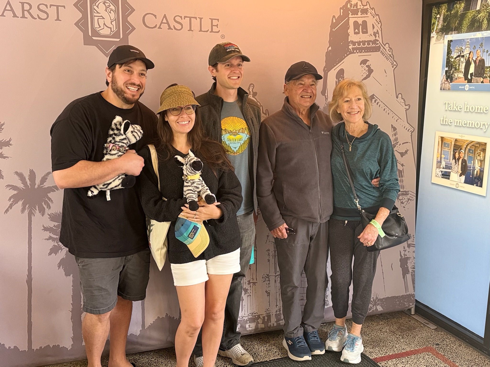 Samantha with family members in a group photo indoors